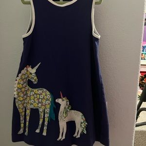 Dark blue dress with unicorn appliqués